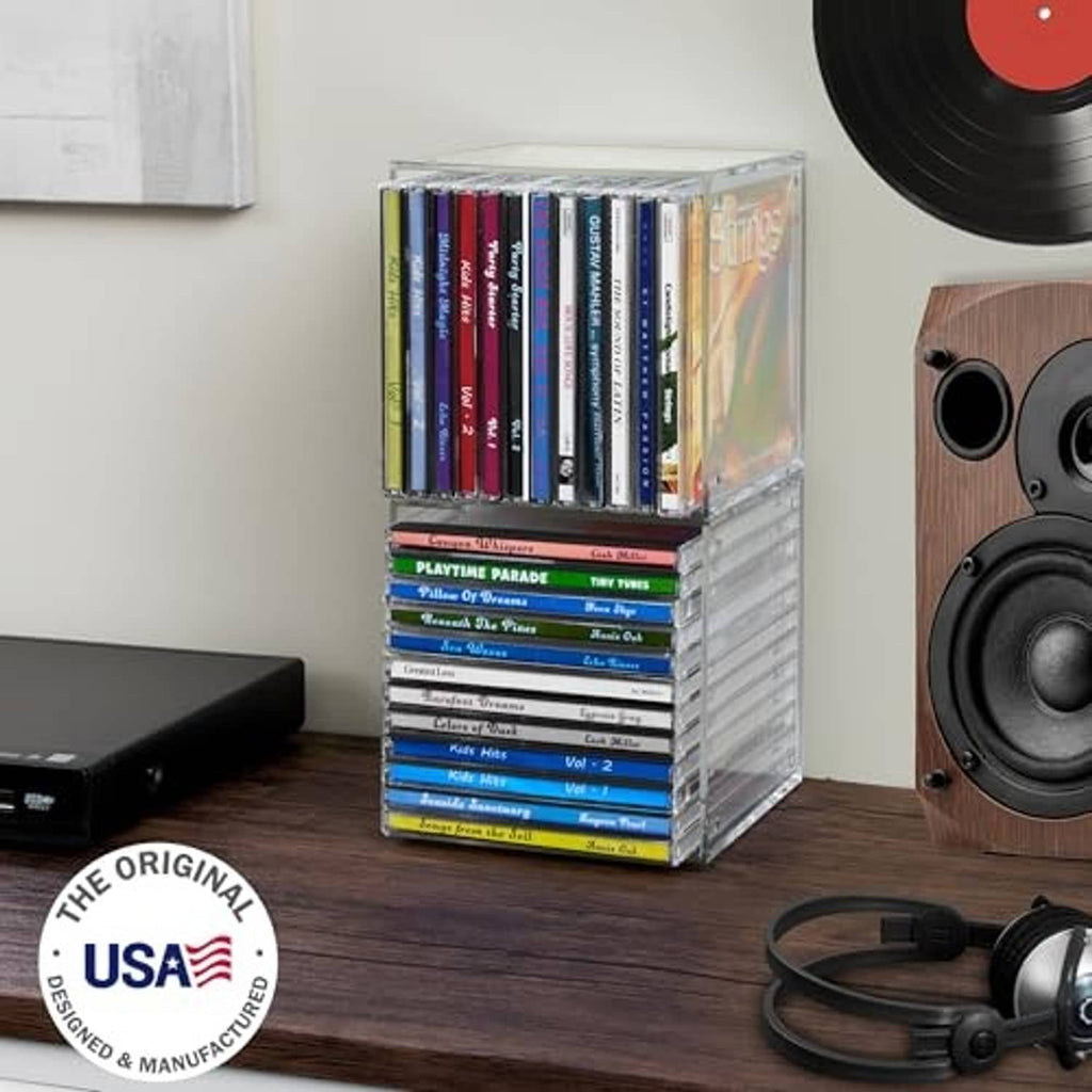 Clear plastic cube CD organizer holding multiple jewel cases, stacked two levels.