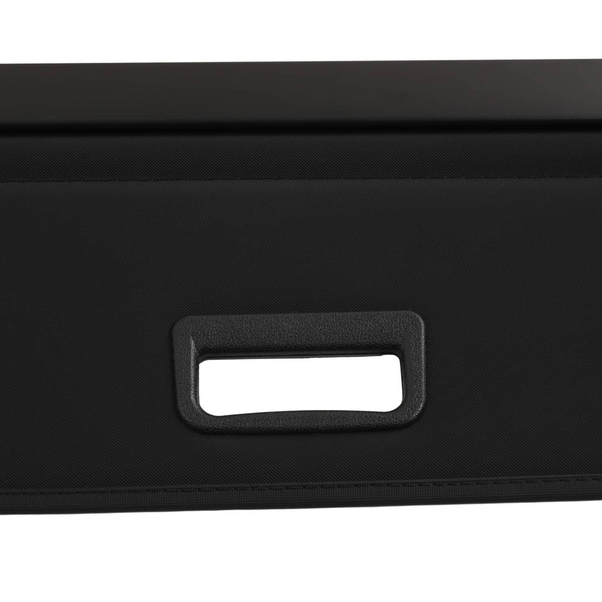 Retractable cargo cover luggage shade, close-up of rectangular handle opening