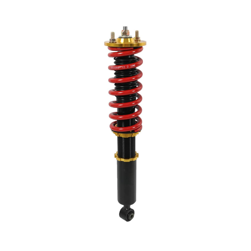 Coilover shock absorber with red spring and black body, gold adjuster collar at top