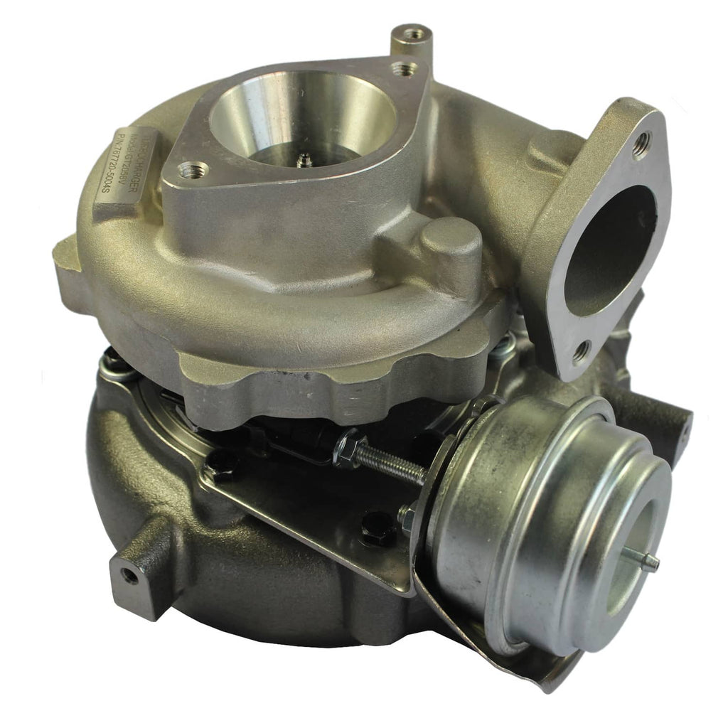Turbocharger with cast metal housing and round inlet/outlet ports