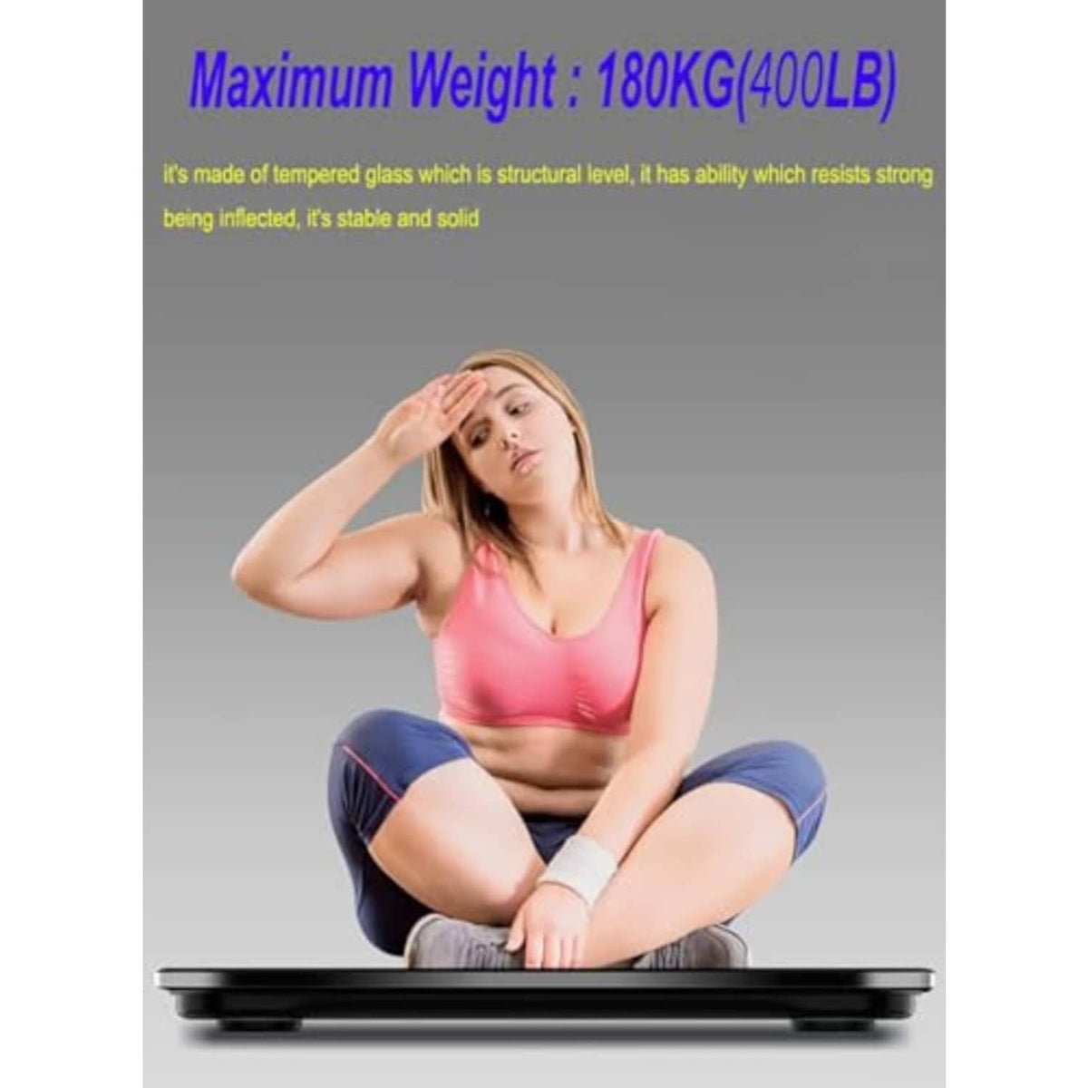 Black digital bathroom scale with max capacity 400 lb/180 kg; tempered glass top