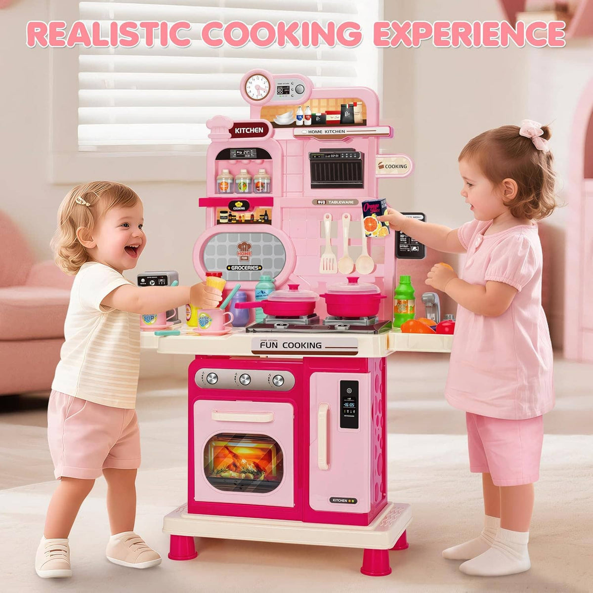 Kids kitchen playset toy in use by two children pretending to cook at the counter
