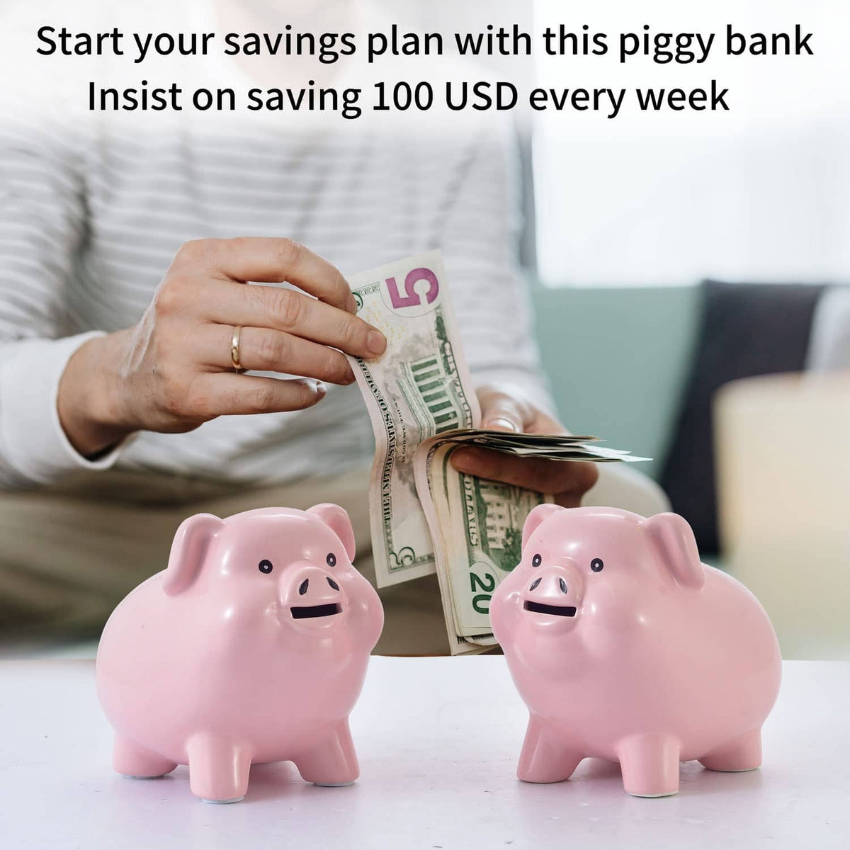 Two pink ceramic piggy banks with smiling faces, placed on a tabletop