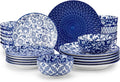 Blue and white patterned dinnerware plates and bowls set with assorted stacks