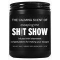 Black jar candle with bold white label and lit wick; soy wax, 9 oz.