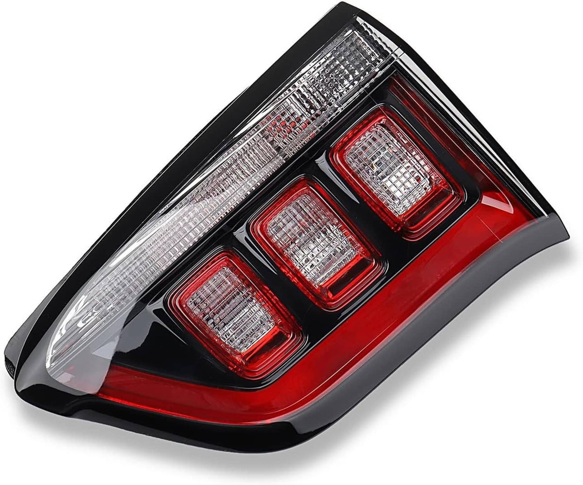 Right inner halogen tail light, angled view of three red lenses in black frame