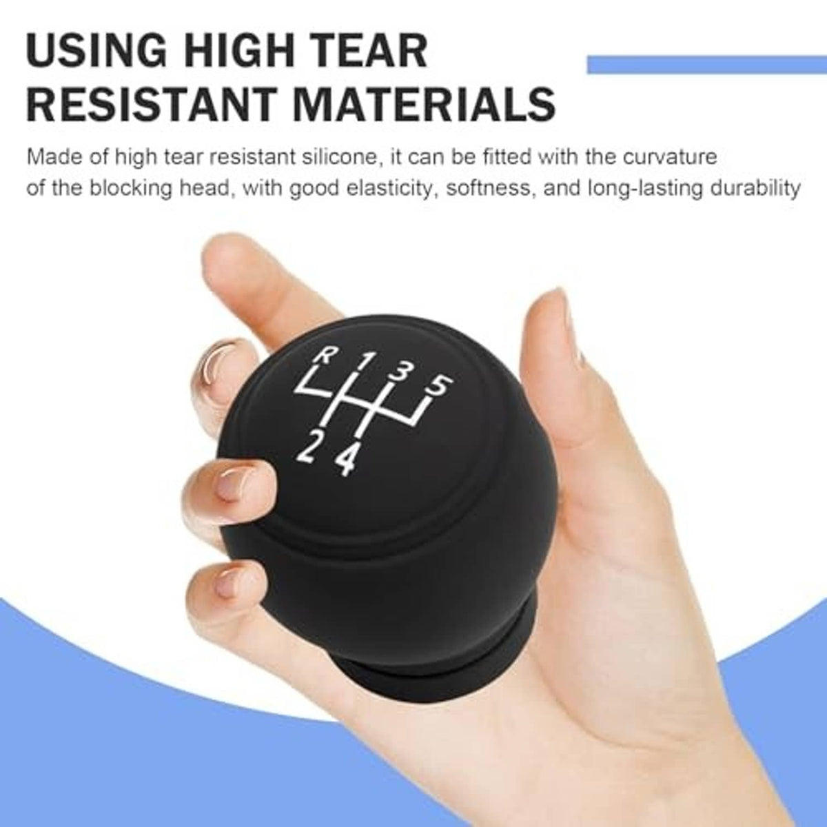 Round black silicone gear shift knob cover held in hand, showing 5-speed markings