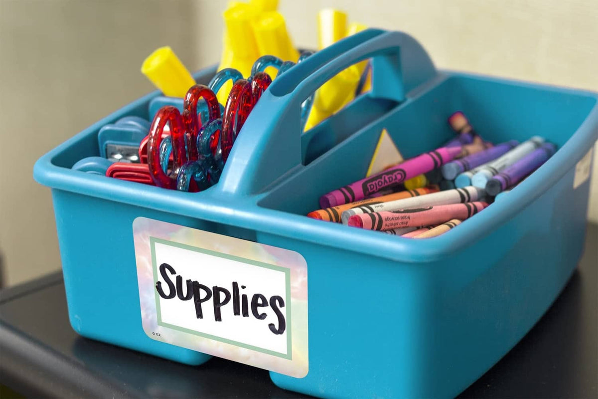 Pastel pop name label in supplies bin, white tag with green border and 'Supplies'