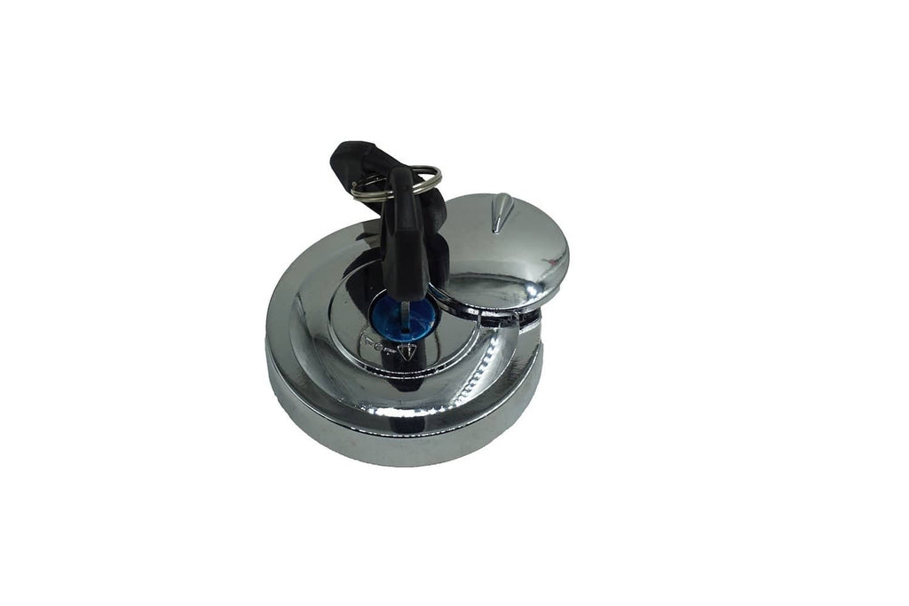 Gas cap lock with chrome face and black keys, key slot visible