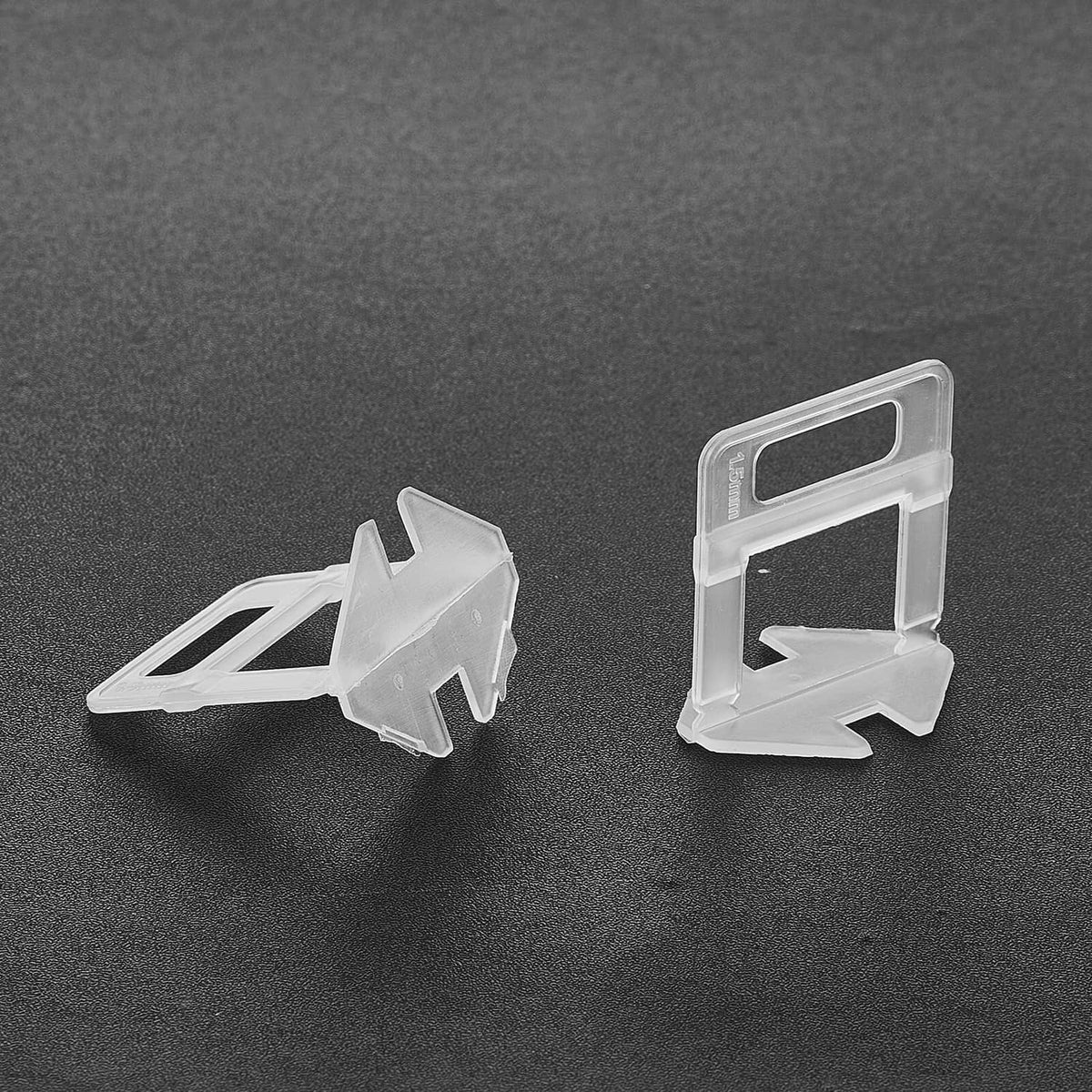 Tile leveling system clips, clear plastic spacer clips