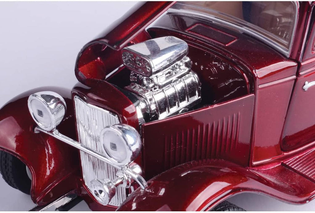 Red 1932 Ford coupe diecast model car close-up of chrome engine and front grille.