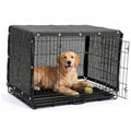 Black dog kennel shade cover over wire dog crate with dark fabric panels
