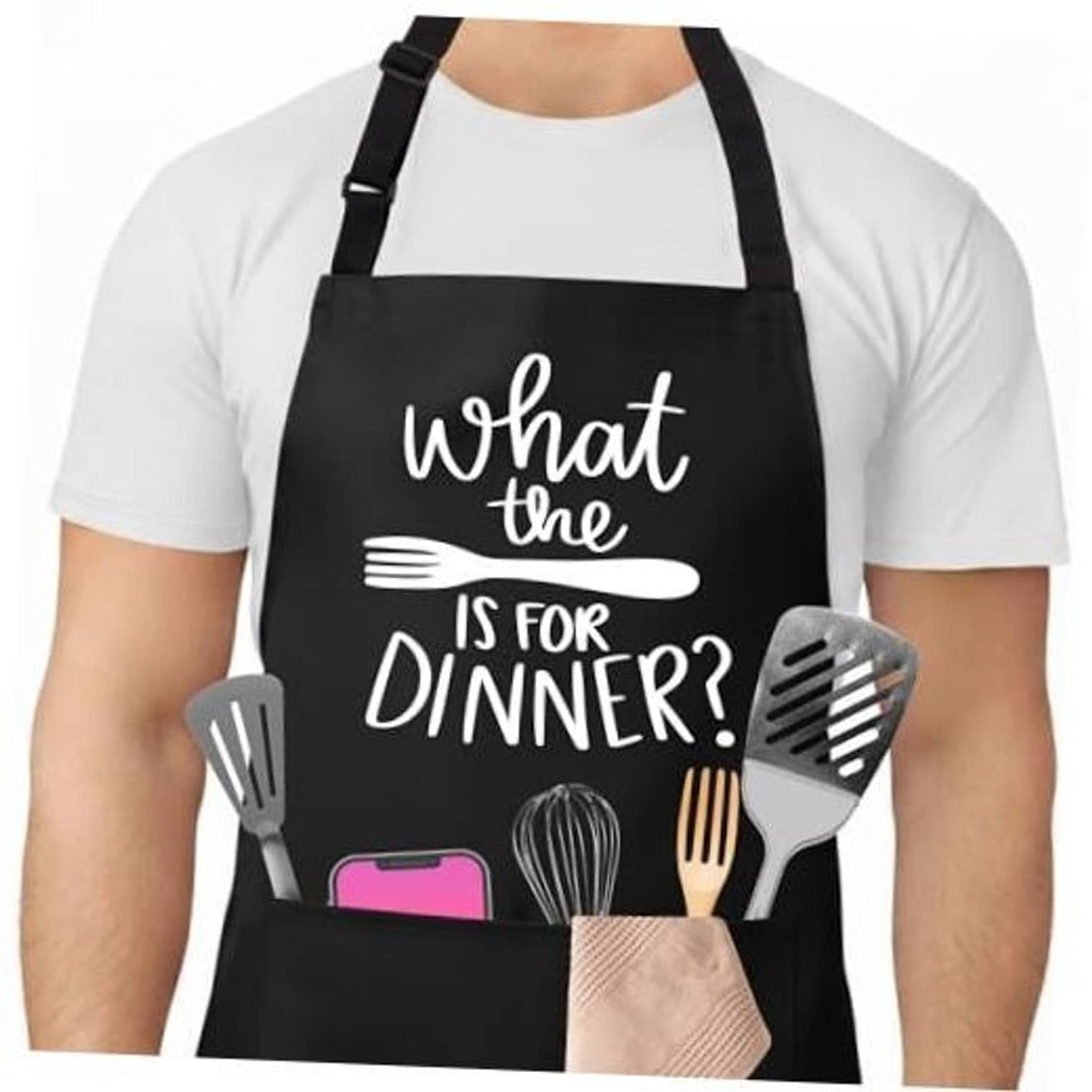 Black cooking apron with white “What the is for dinner?” graphic and utensil icons