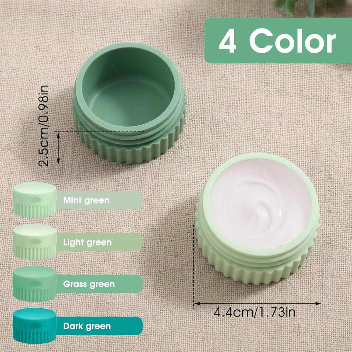 Four small silicone travel jars with ribbed bases and round lids in green tones