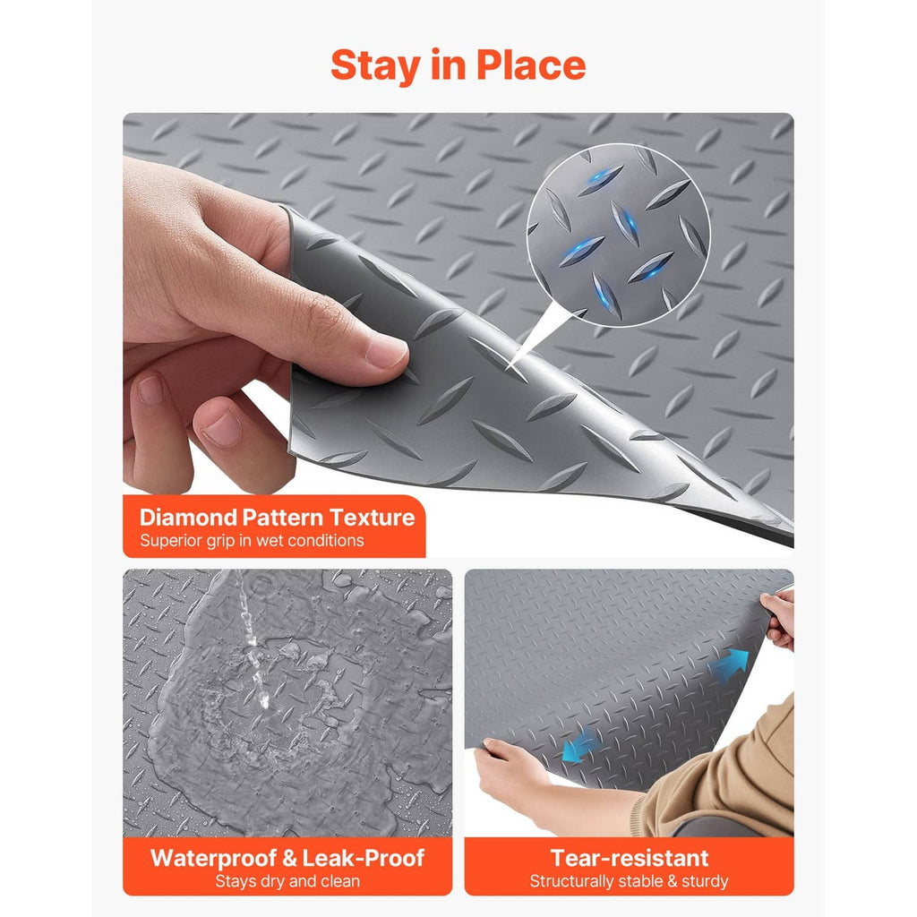 Silver gray PVC diamond-pattern floor mat corner pressed flat by hand.
