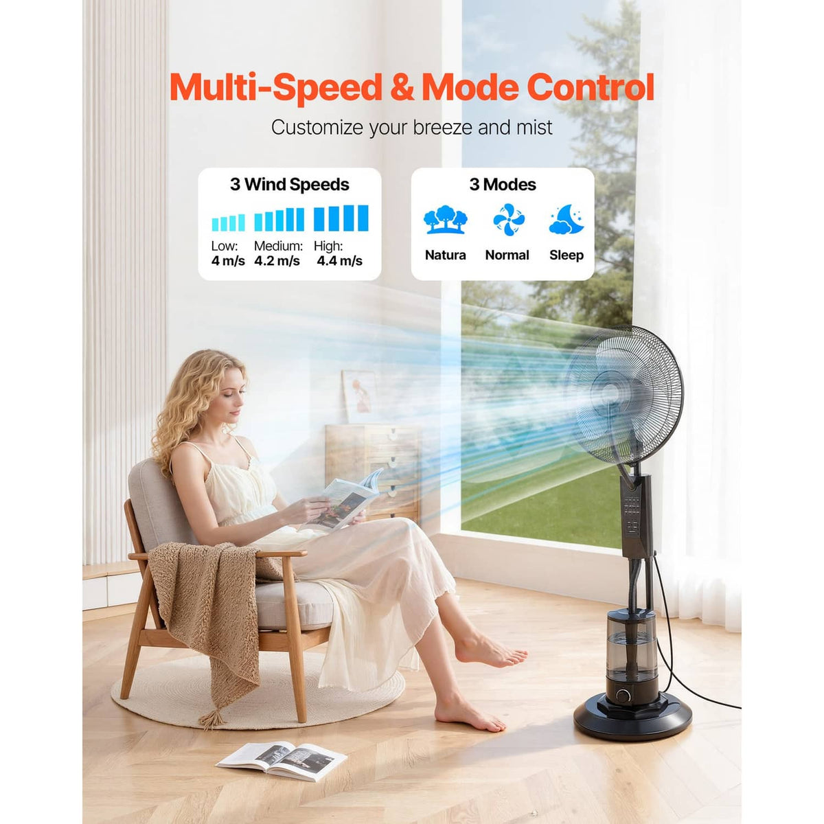 Black misting standing fan with wide grille and transparent water tank