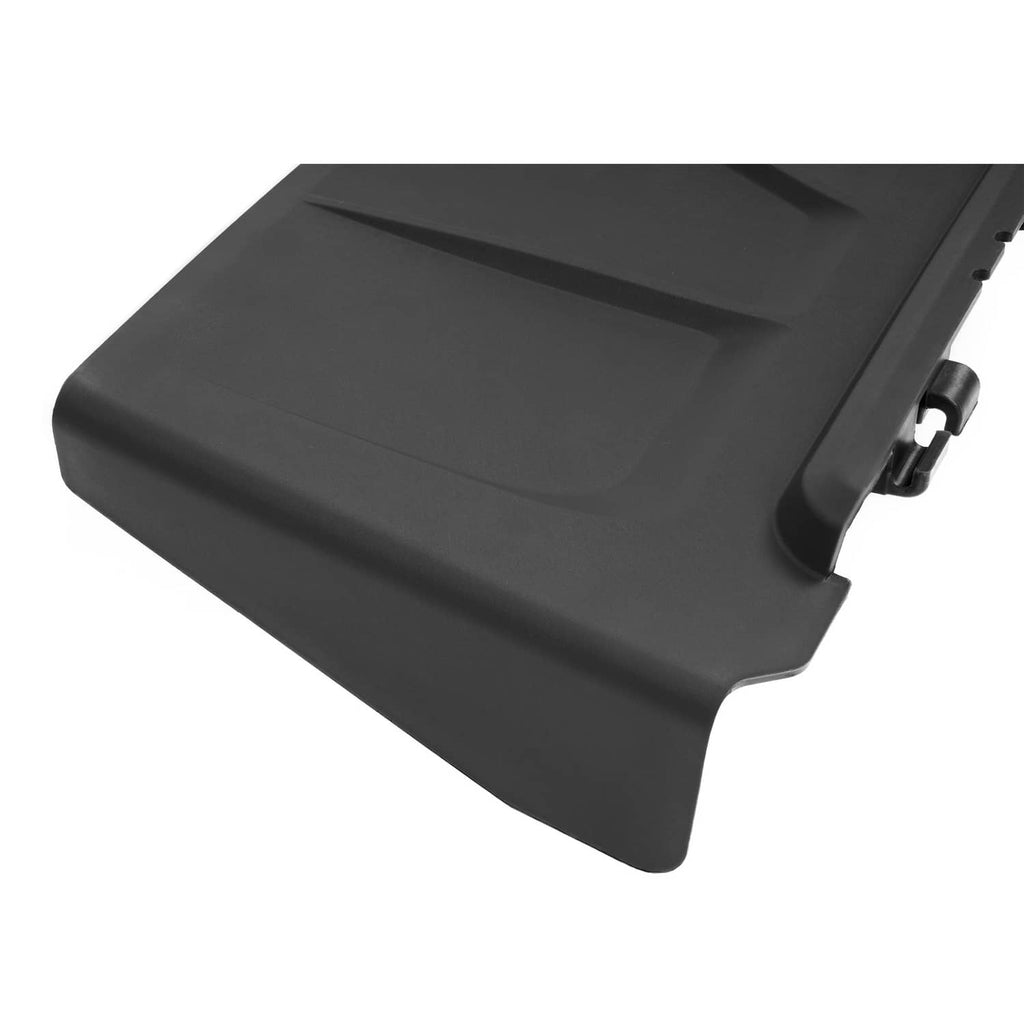 Black discharge chute top cover with stepped molded contours and side opening.