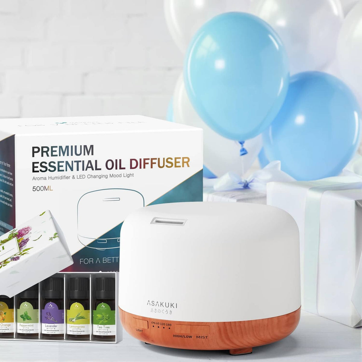 Essential oil diffuser with white top and orange wood base