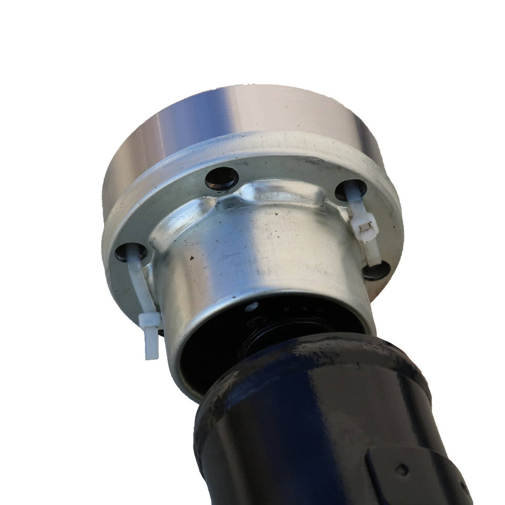 Drive shaft assembly end housing with silver metal cap and black rubber boot