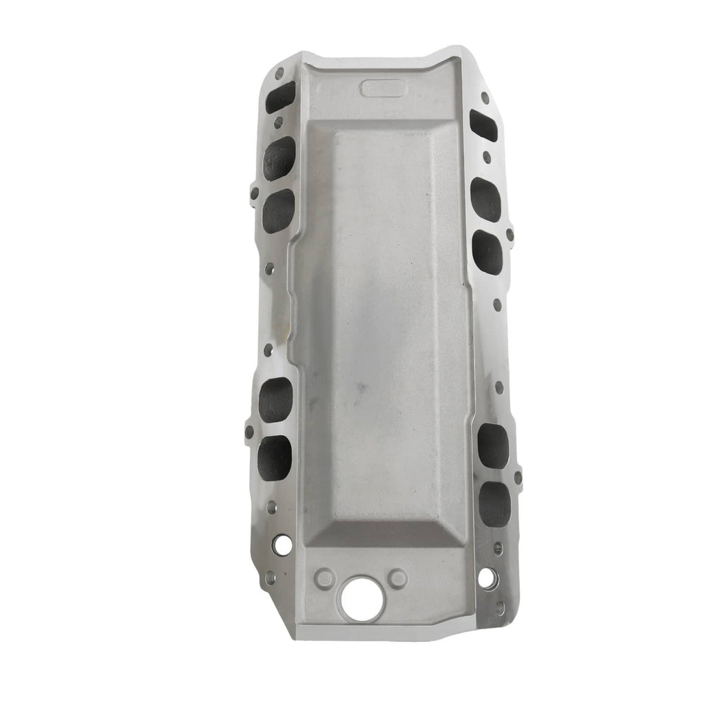 Dual-plane intake manifold housing with multiple port openings and bolt holes around edges.