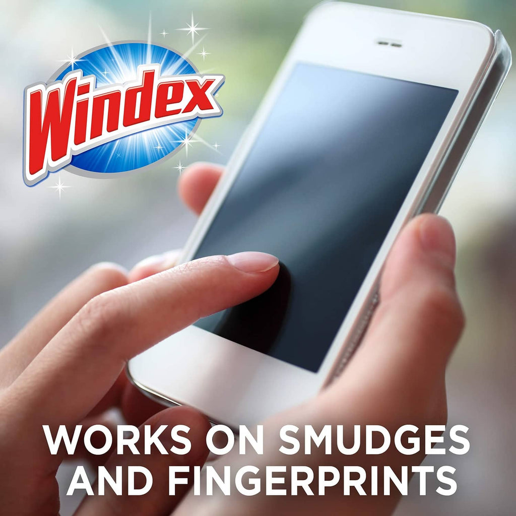 Hand wiping smartphone screen with pre-moistened cleaning wipe for smudges