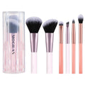 Travel makeup brush set with clear pink storage case and 6 mini brushes, black bristles