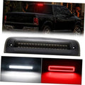 Smoked LED third brake light bar with circular LED segments in dark housing