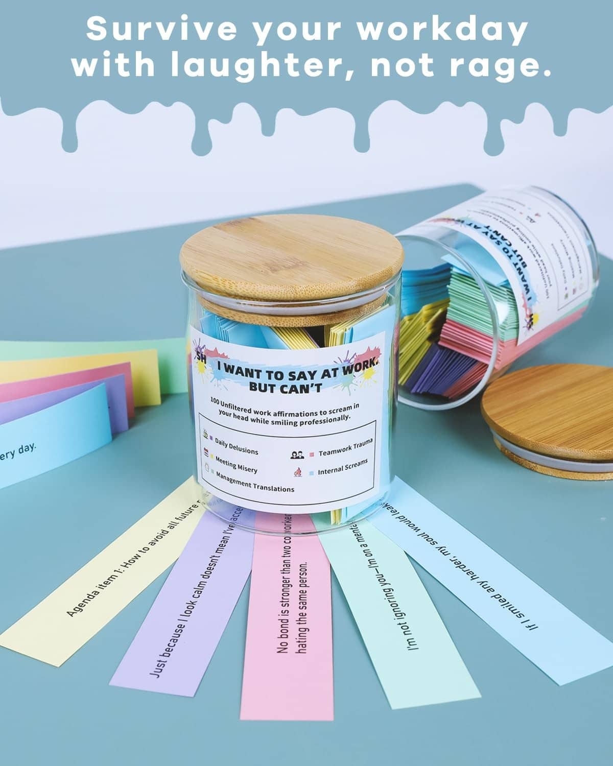 Glass affirmation jar with wood lid, color-coded notes spread on desk