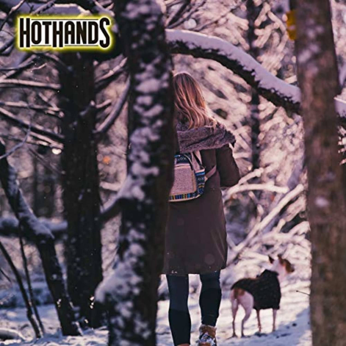 HotHands hand warmer pack in use, disposable air-activated warmer with logo