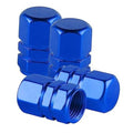 Blue aluminum tire valve stem caps with hex cover tops and threaded openings (4-pack).