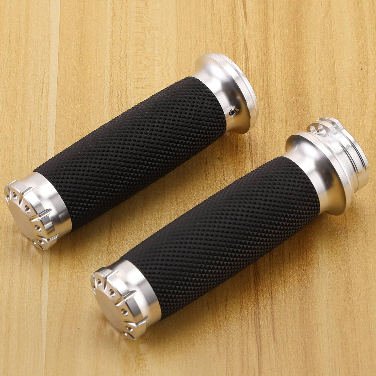 Motorcycle handlebar grips, black textured rubber with chrome metal end clamps
