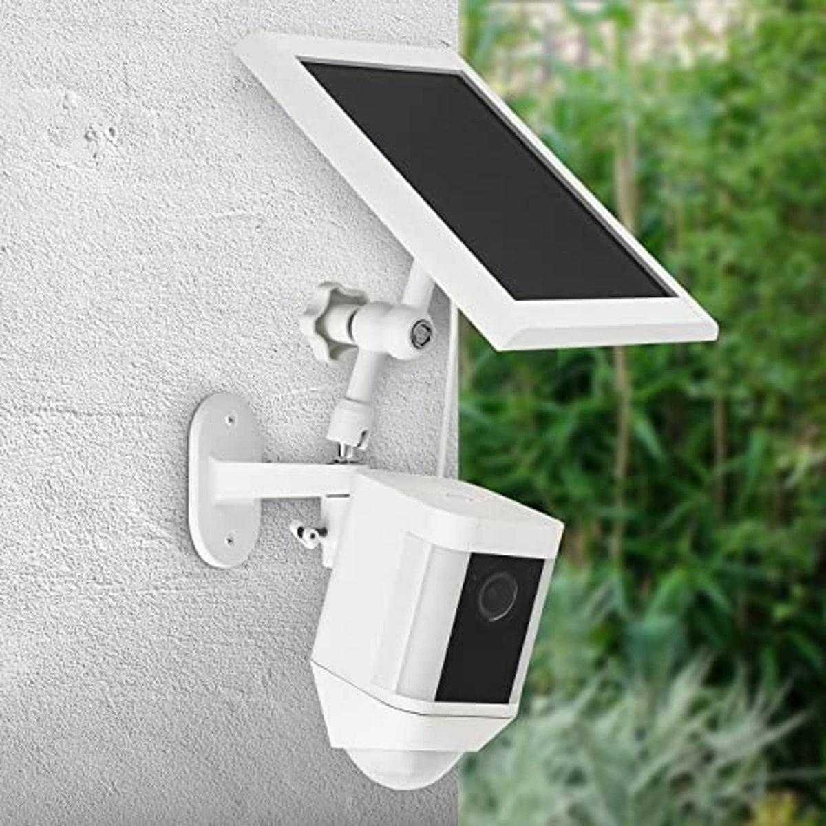 White solar panel wall mount with pivoting bracket and attached camera housing
