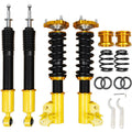Adjustable coilover suspension kit: two black strut shocks, gold mounts, yellow cylinders