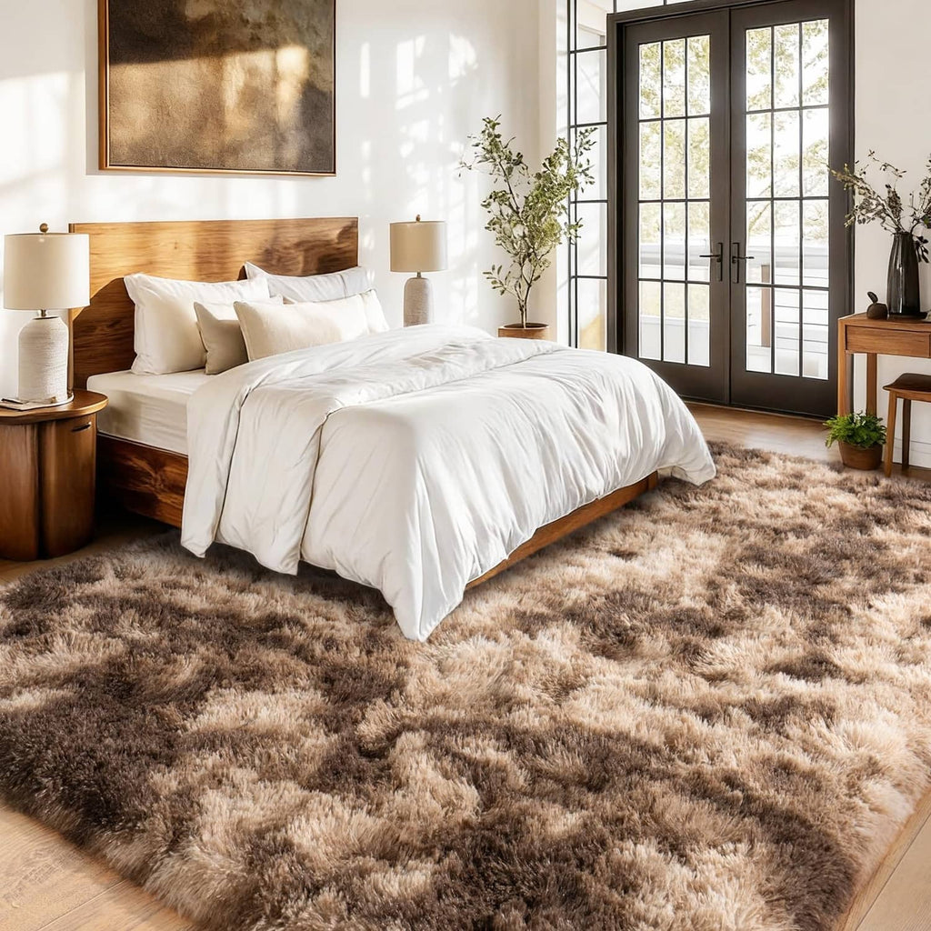Rectangular shag area rug, tie-dyed brown and tan fuzzy surface, 6x9 ft