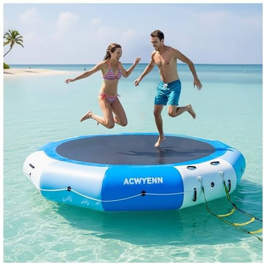 Blue and white floating water trampoline with black round jumping surface and side attachment points.