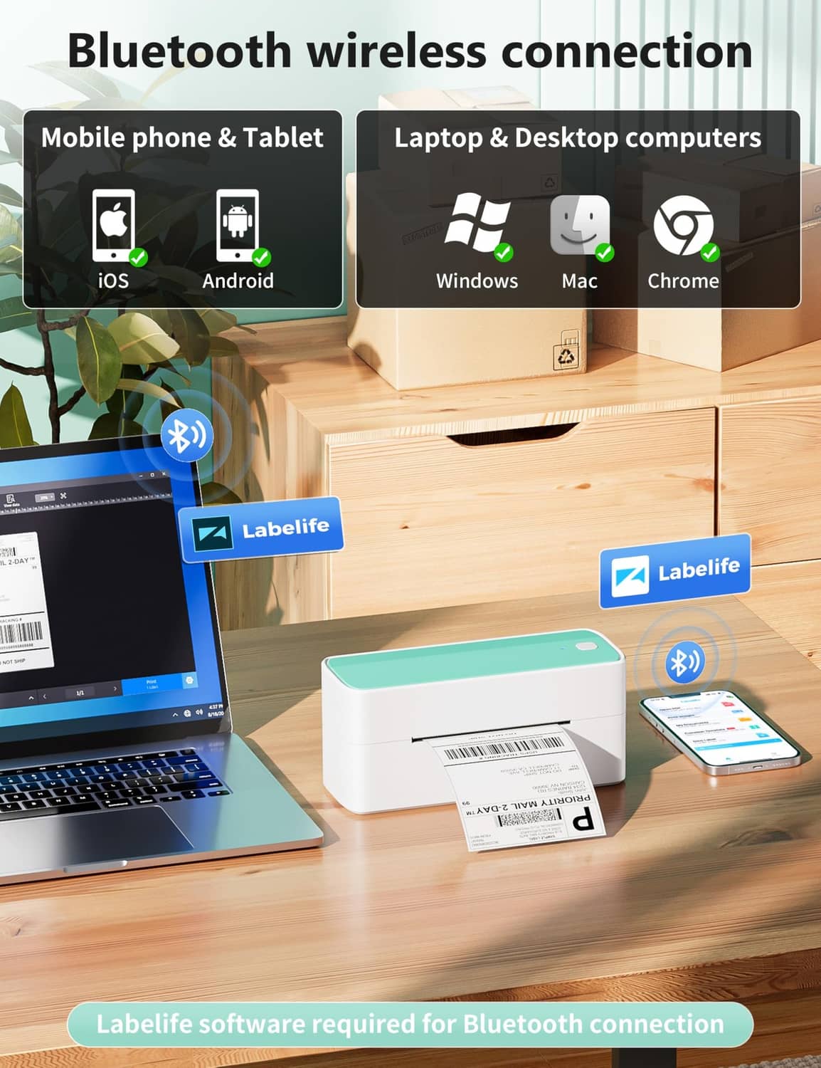 Mint-green wireless thermal label printer on desk with printed label visible