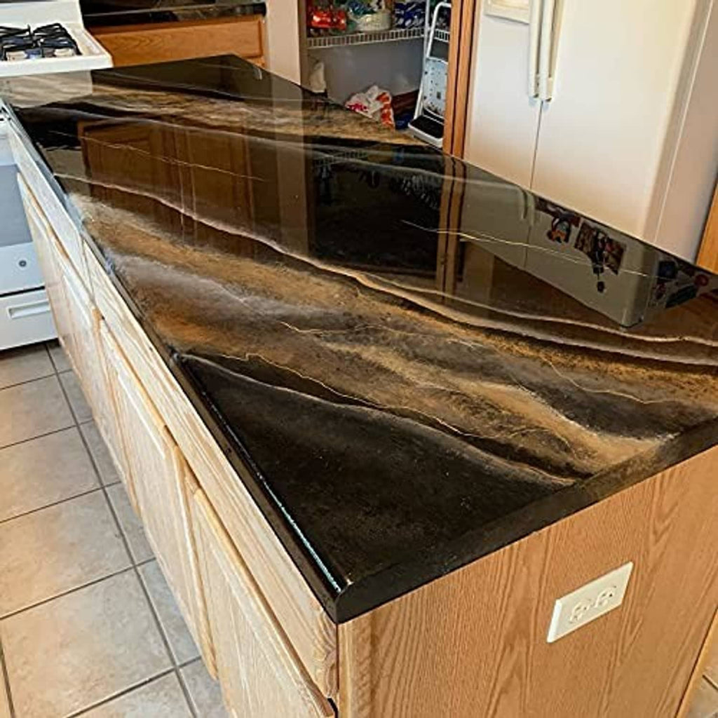 Black epoxy-coated countertop with swirling highlights and glossy resin finish
