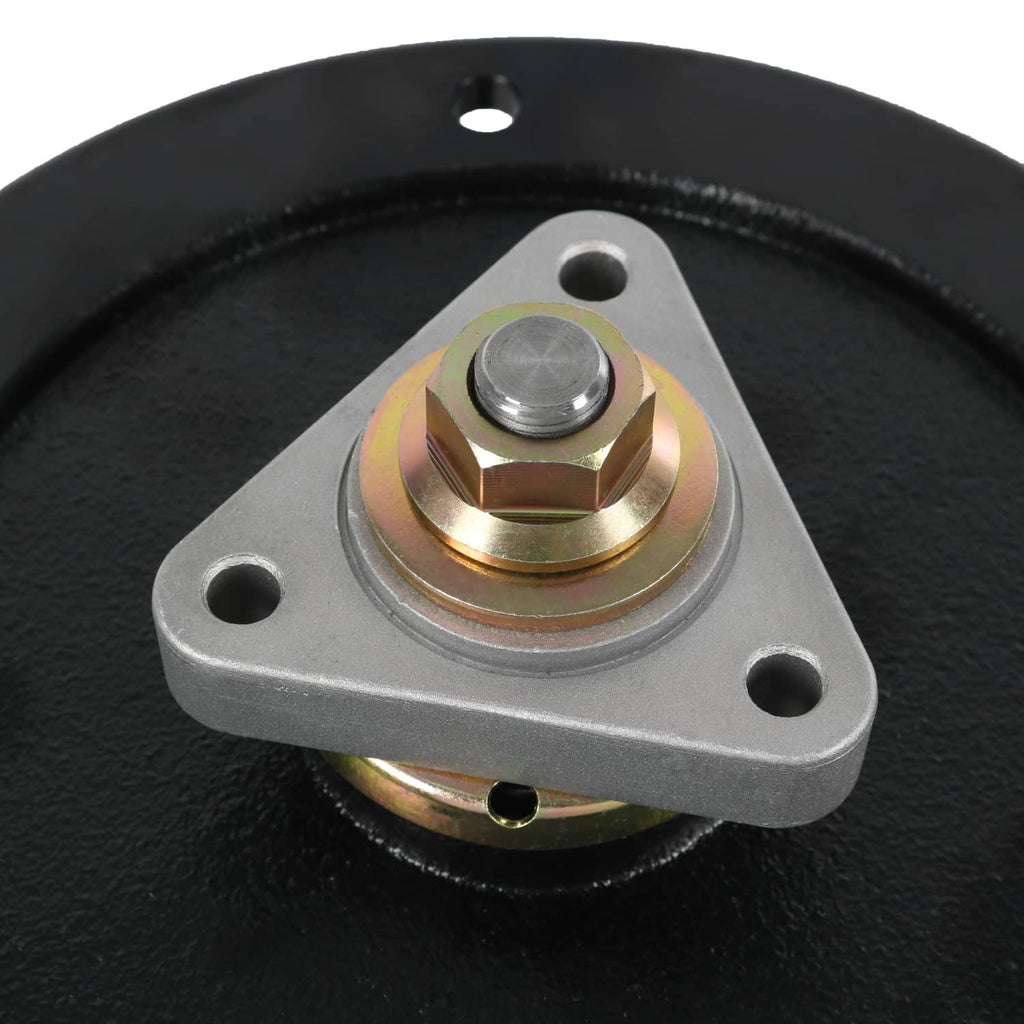 Close-up deck spindle mounting plate with central bolt and surrounding metal collar