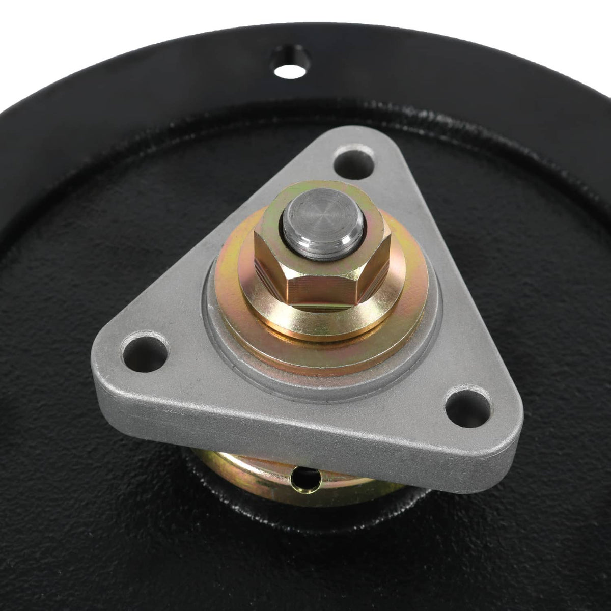 Close-up deck spindle mounting plate with central bolt and surrounding metal collar