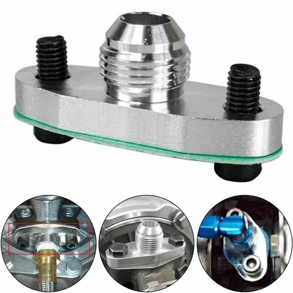 Turbo oil drain outlet flange adapter mounted on metal housing with green gasket seal