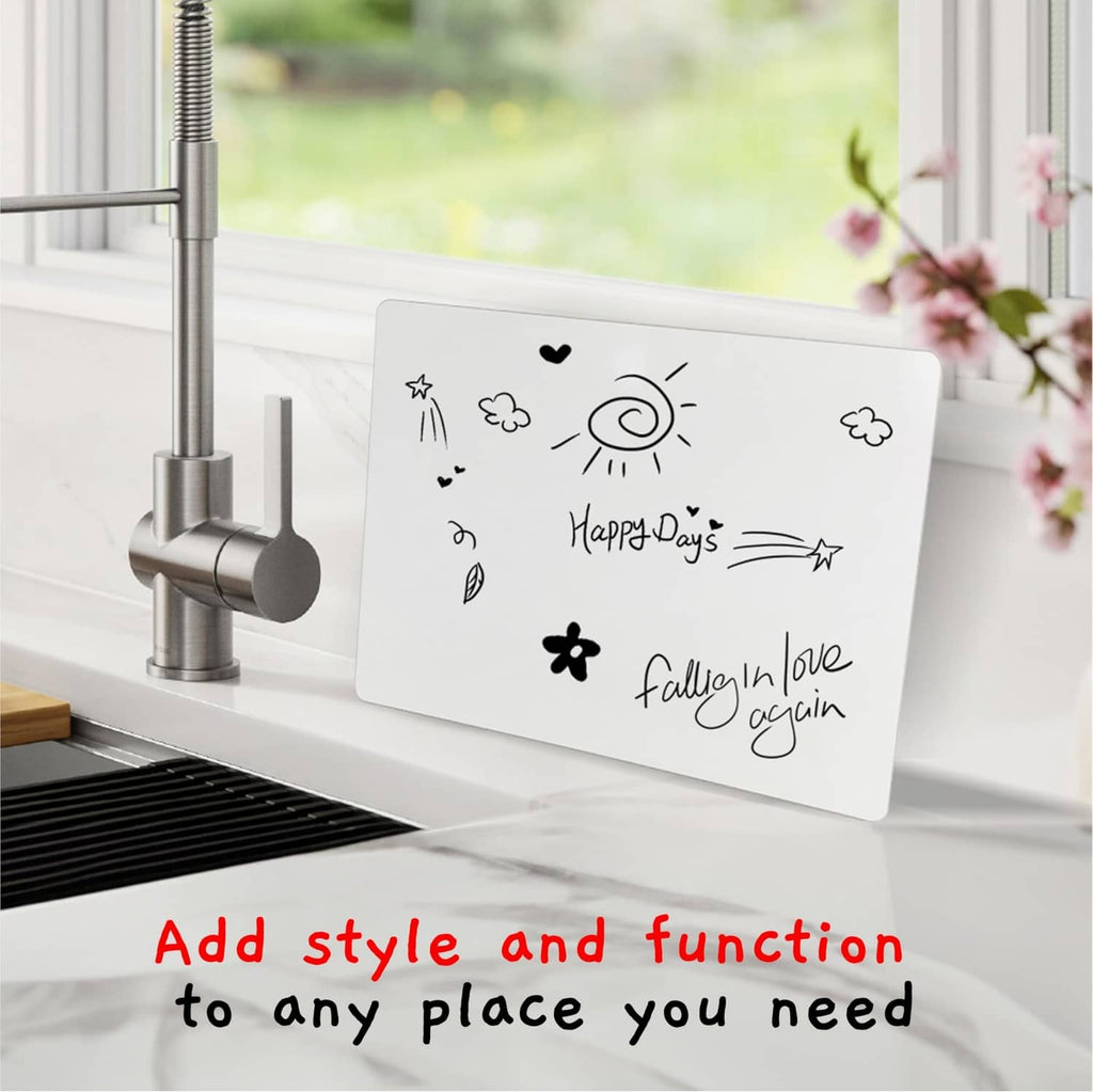 White dry-erase lapboard with icon doodles on a kitchen countertop