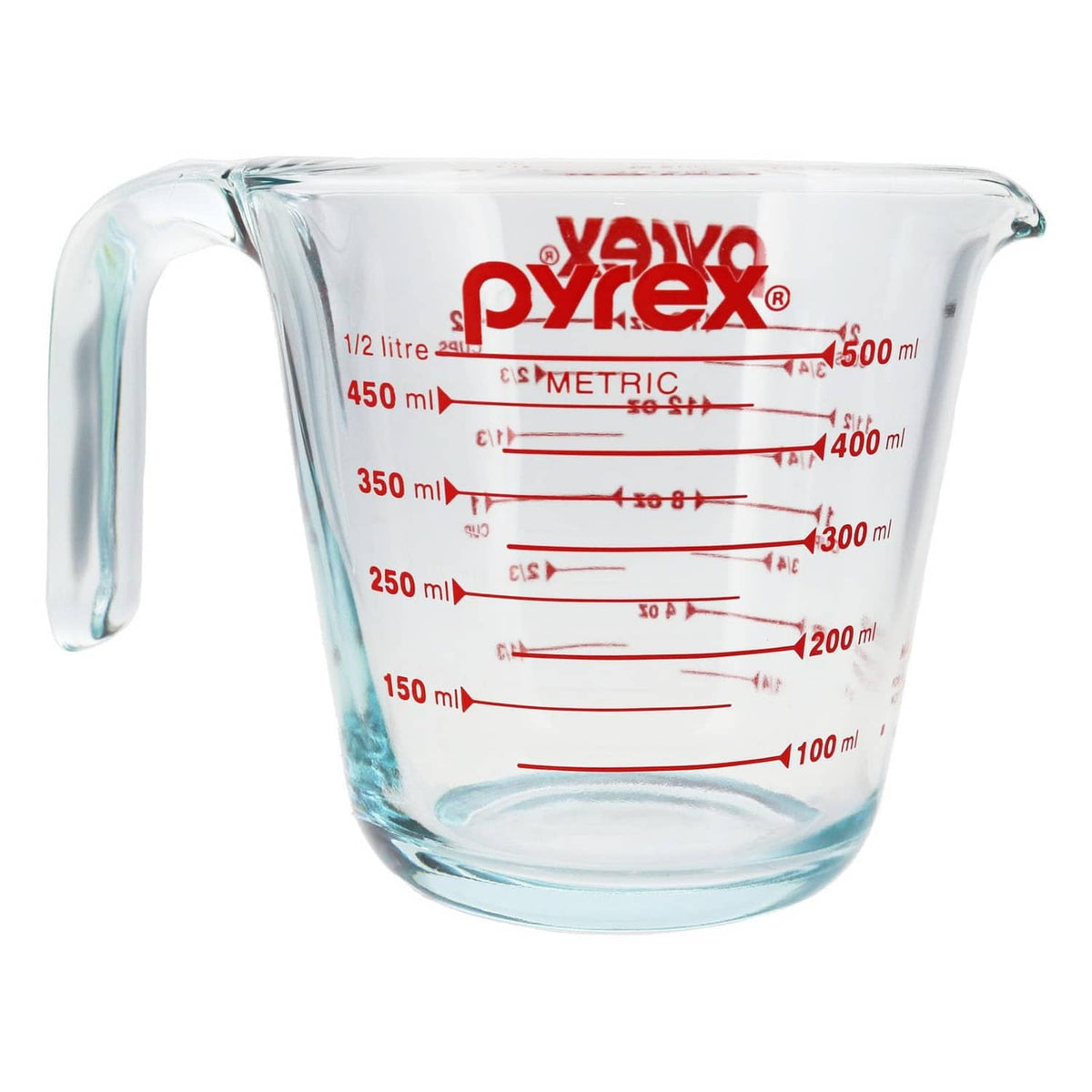 Glass measuring cup with red metric ml scale, spout and loop handle