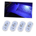 Blue LED interior floor light strip illuminating textured mat surface