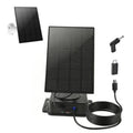 Solar panel security charger with mounting base and coiled charging cable