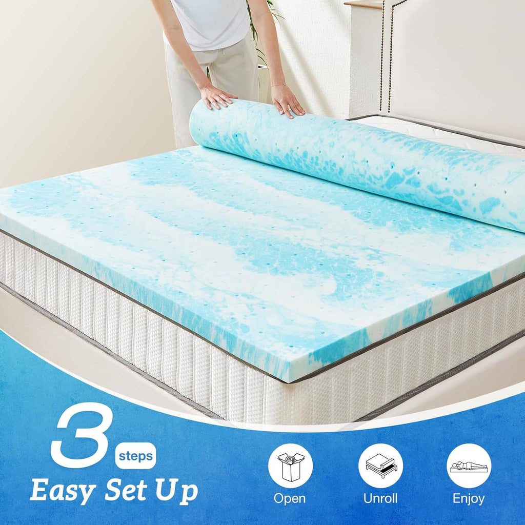 Blue mattress topper on a bed with visible thickness edge and open seam