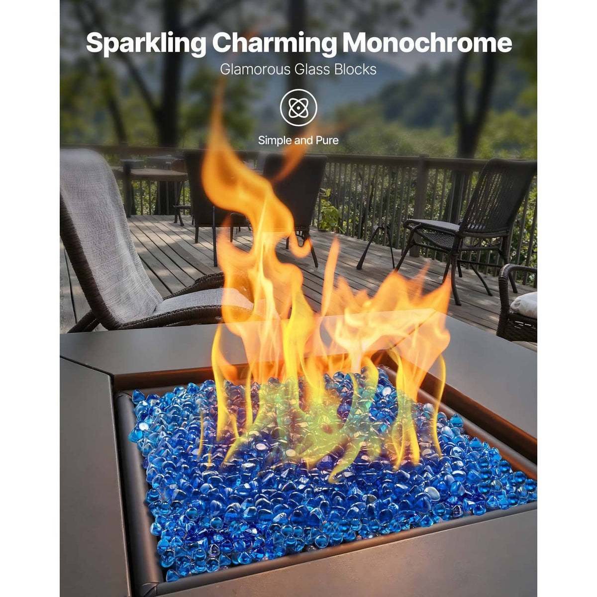 Caribbean blue glass rocks filling a fire pit around a burning flame