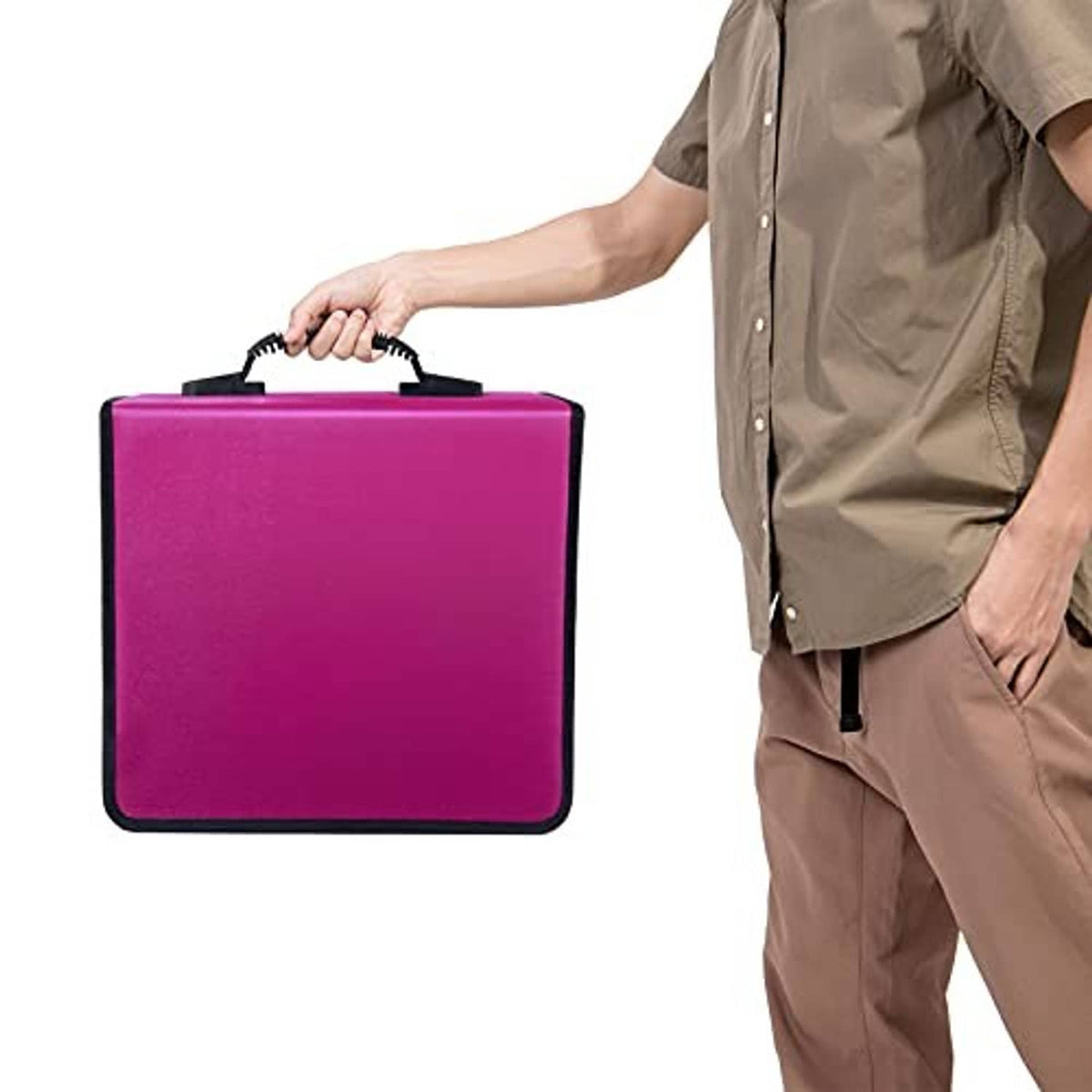 Magenta CD storage case with black trim and carry handle, held in hand