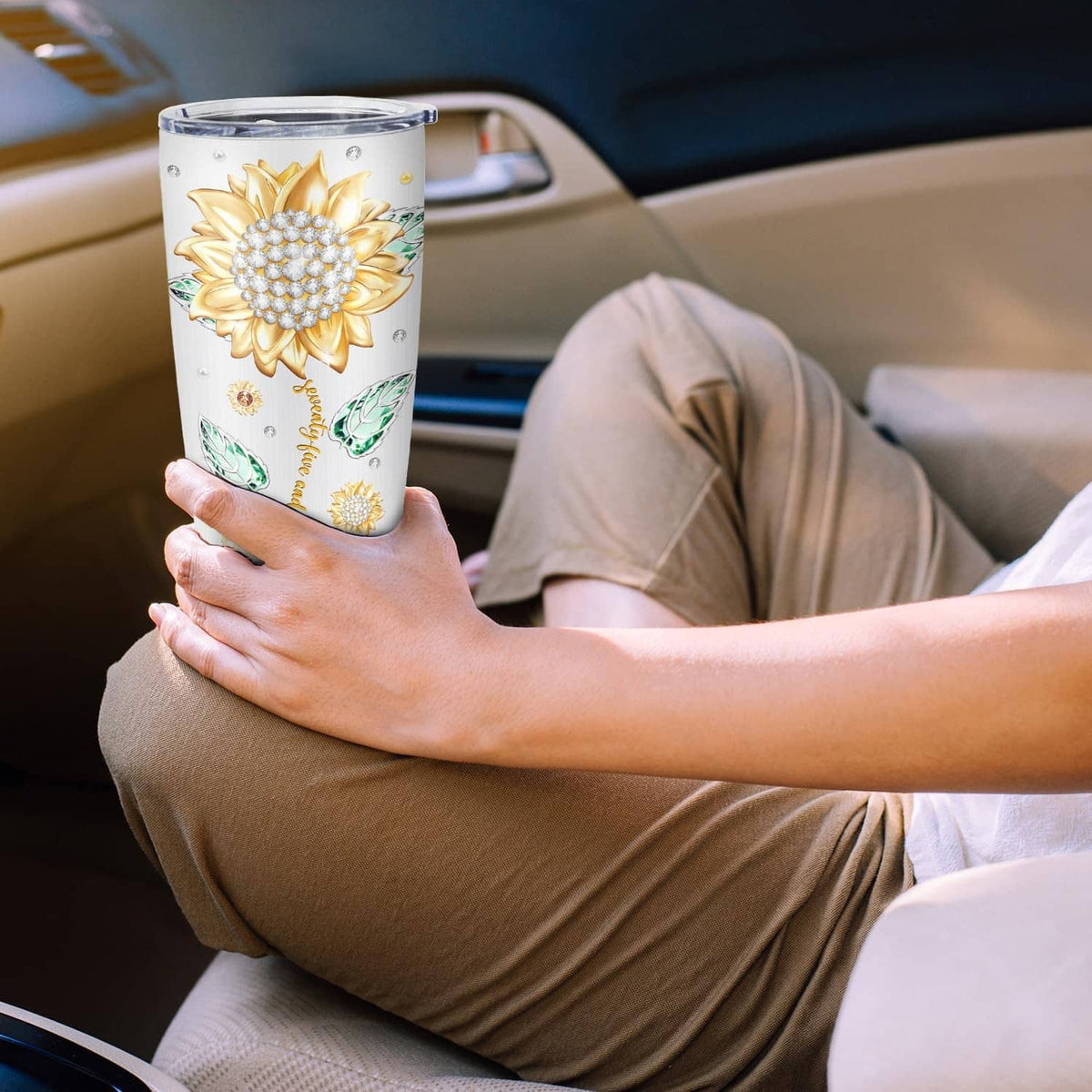 White 20 oz tumbler with gold floral and green butterfly pattern