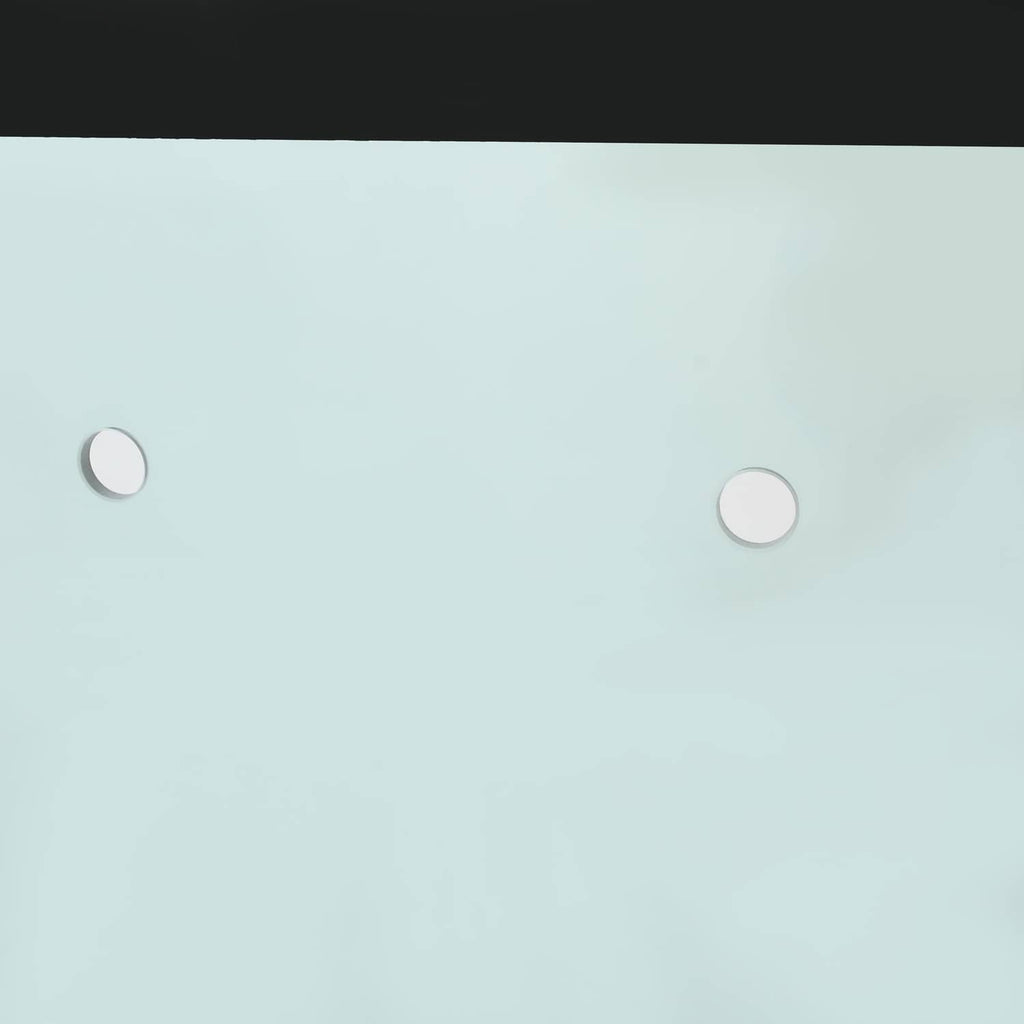 Close-up of light blue window glass showing two metal-capped mounting holes