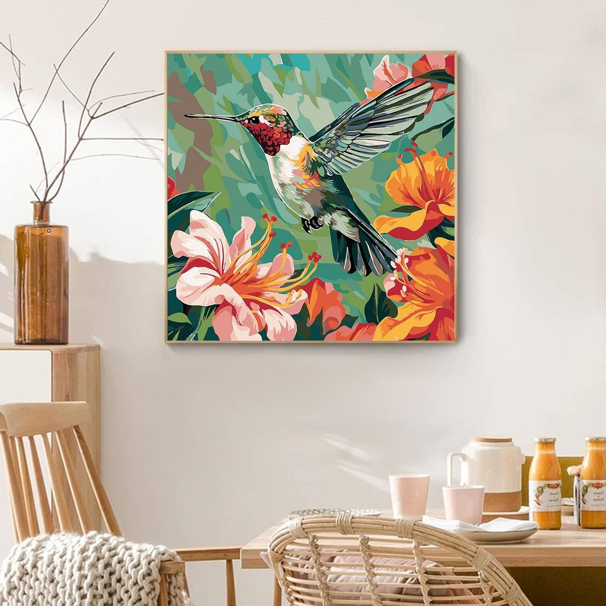 Paint-by-numbers hummingbird painting displayed in a wall frame